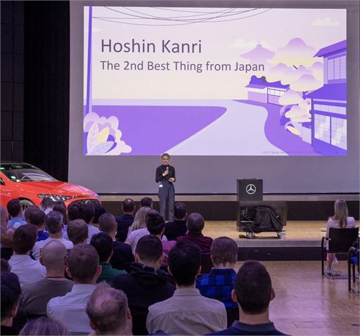 Impulsvortrag auf einer Bühne vor Publikum